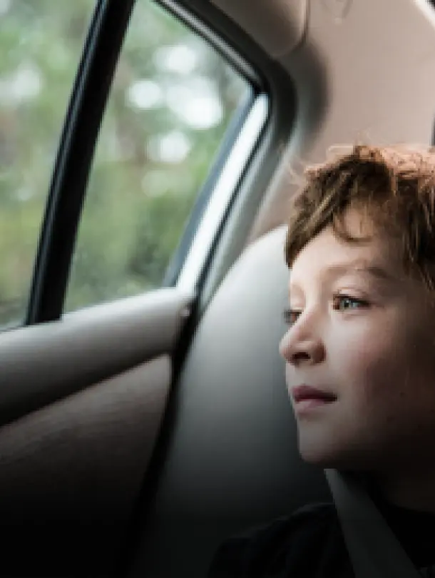 Child in sustainable mobility car